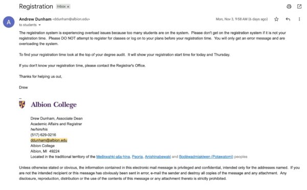 A screenshot of an email interface on a computer screen. The email is from Andrew Durham at Albion College, addressed to an individual concerning registration issues due to system overload. The subject line reads “Registration,” and the email explains the situation, suggesting checking registration tasks again. The interface includes common email options like Compose, Inbox, Sent, and Drafts on the left side, and the email content occupies the central to right parts of the screen. The Albion College logo is visible, and at the bottom of the email, contact information for Andrew Durham is provided. 